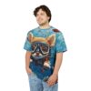 Vibrant blue and white bubbles, coral, and fish cover this graphic streetwear tee, depicting a dog in scuba gear exploring underwater.