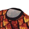 Fiery red and golden scales cover this 3D graphic t-shirt with a bold, textured look.
