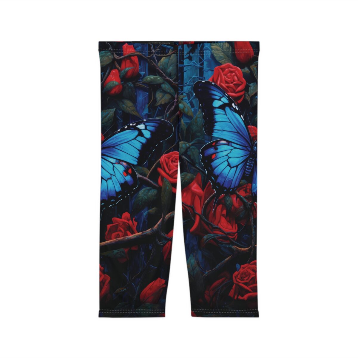 Women's leggings with a dark floral print featuring vibrant blue butterflies and deep red roses against a shadowy, enchanted background.