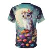 Teal and dark blue clouds with white stars cover this sublimation graphic tee, depicting a whimsical owl with floral adornments sitting on mushrooms under a full moon.