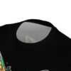 Black fabric with a graphic design of a wolf's head in vibrant green and yellow tones, featuring tribal patterns.