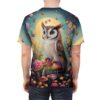 Whimsical mushrooms, butterflies, and flowers cover this all over print t-shirt, depicting a wise owl perched on fungi under a large moon.