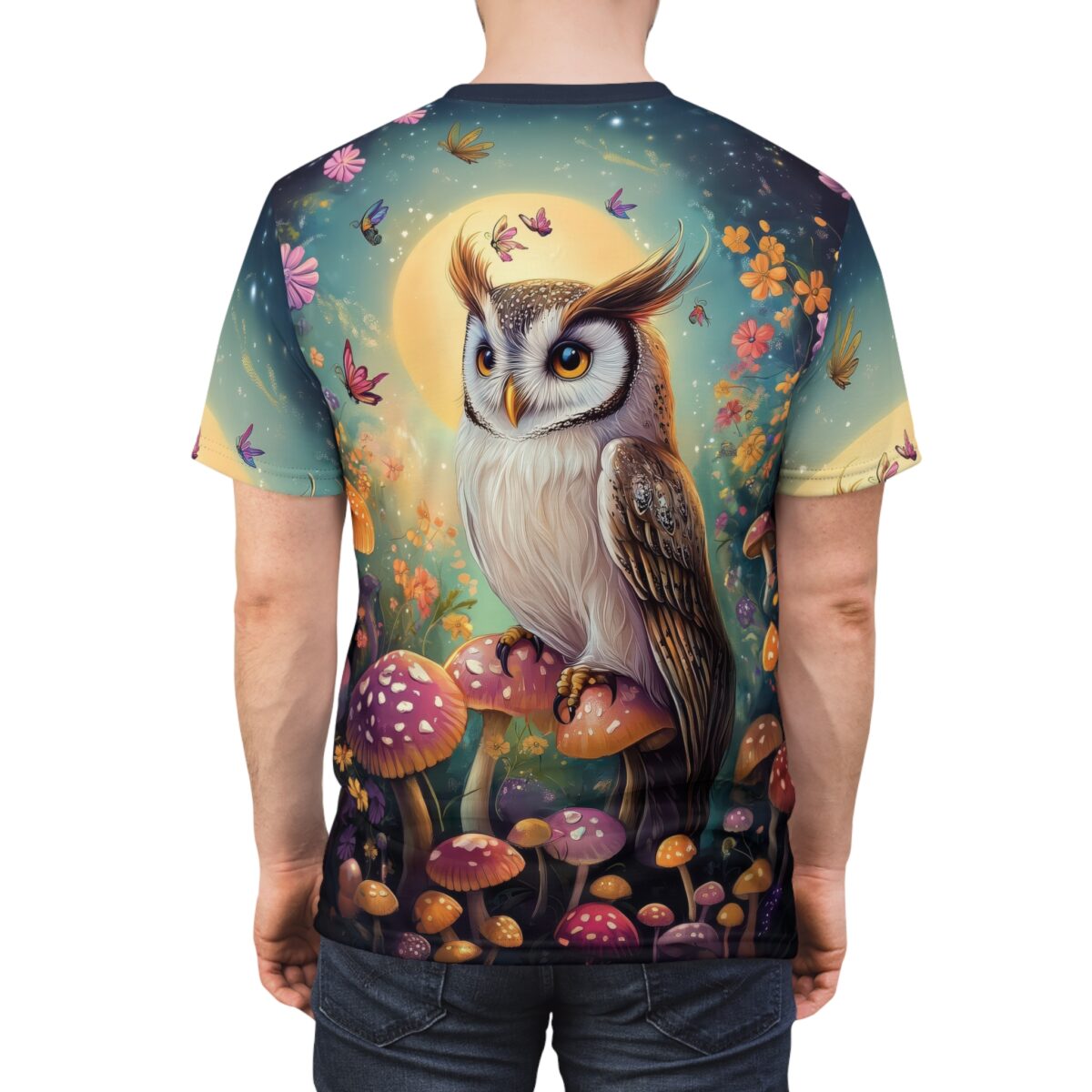 Whimsical mushrooms, butterflies, and flowers cover this all over print t-shirt, depicting a wise owl perched on fungi under a large moon.