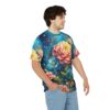 All over print sublimation tee with vibrant floral design and celestial blue background.