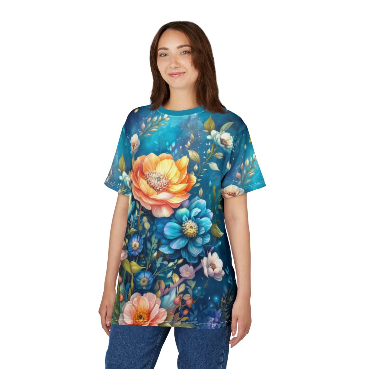 Vibrant all over print sublimation tee featuring a seamless wrap around graphic of blue and orange flowers on a teal background.