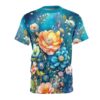 Vibrant blue and teal hues with yellow and pink floral patterns cover this oversized full print tee, depicting a dreamy garden scene with glowing accents.