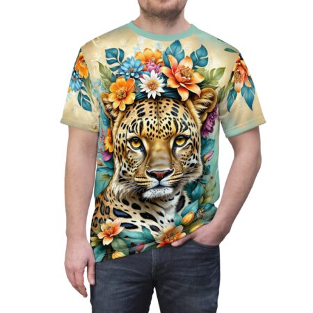 All over print sublimation tee featuring a detailed leopard face framed by vibrant flowers and lush green leaves.