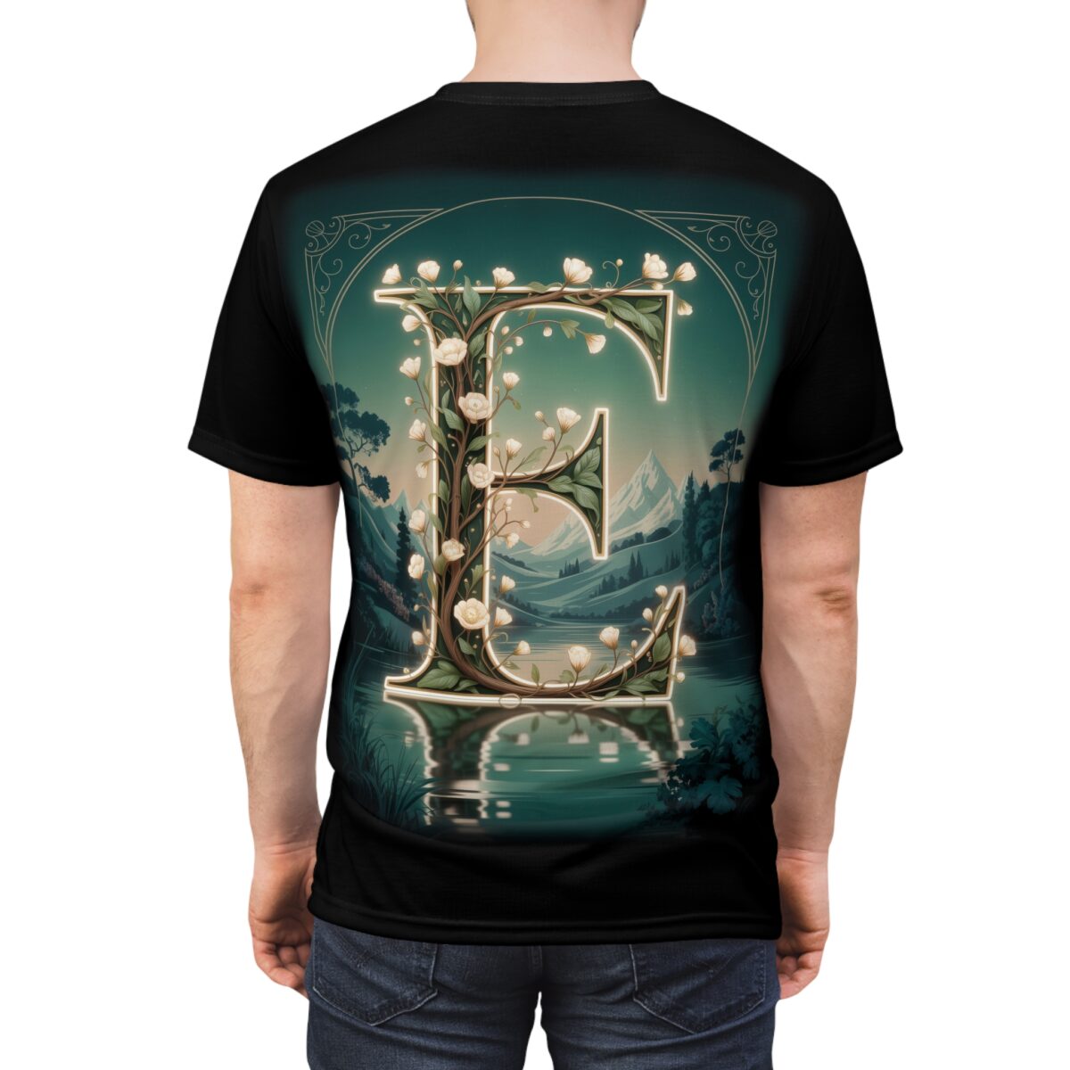 Floral letter E graphic sublimation tee showcasing a serene mountain lake landscape with glowing white flowers.