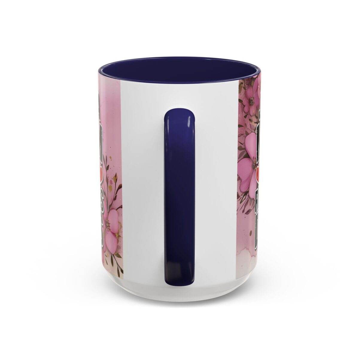 White ceramic coffee mug with navy blue interior and handle, featuring a pink floral and gold glitter design with the word 'Love' on one side.
