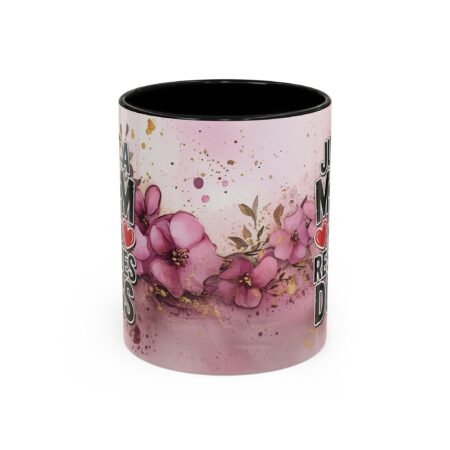 Floral ceramic mug with "Just A Mom Who Loves Dogs" text and pink flowers, perfect gift for dog-loving moms.