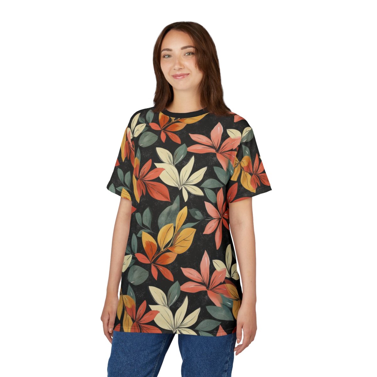 Orange, red, yellow, and green leaves cover this 3D graphic t-shirt, with a dark textured background.
