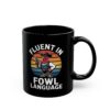 Black coffee mug with a graphic of a cowboy chicken holding a gun, text reads 'Fluent in Fowl Language'.