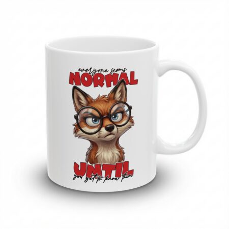 Sarcastic fox wearing glasses with quote "everyone seems NORMAL until you get to know them" printed on a white mug.