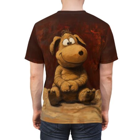 Rich brown and textured brushstrokes cover this patterned tee shirt, featuring a whimsical cartoon dog with wide, expressive eyes.