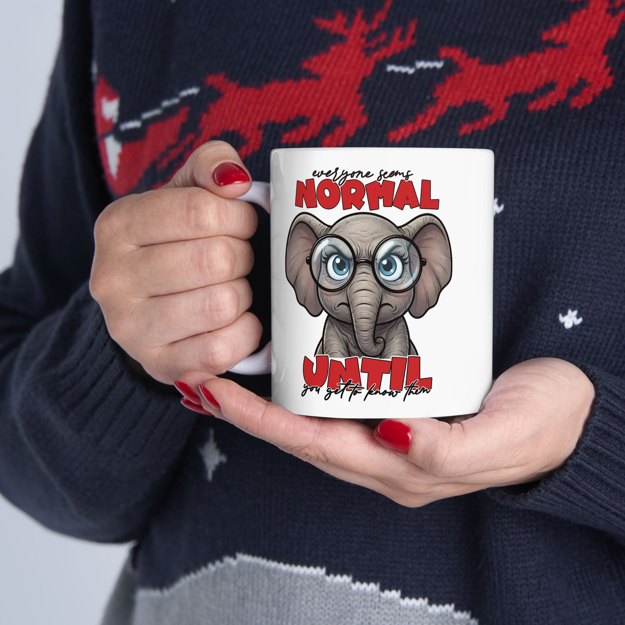 White ceramic mug with a cartoon elephant wearing glasses and a sarcastic slogan.