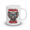 White ceramic mug with a grumpy cartoon elephant wearing glasses, text reads 