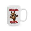 White ceramic mug with a grumpy giraffe wearing glasses, text reads 