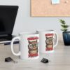 White ceramic mug with a cartoon owl wearing glasses, stating 