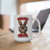 White ceramic mug with a grumpy cartoon rabbit wearing glasses and text that reads