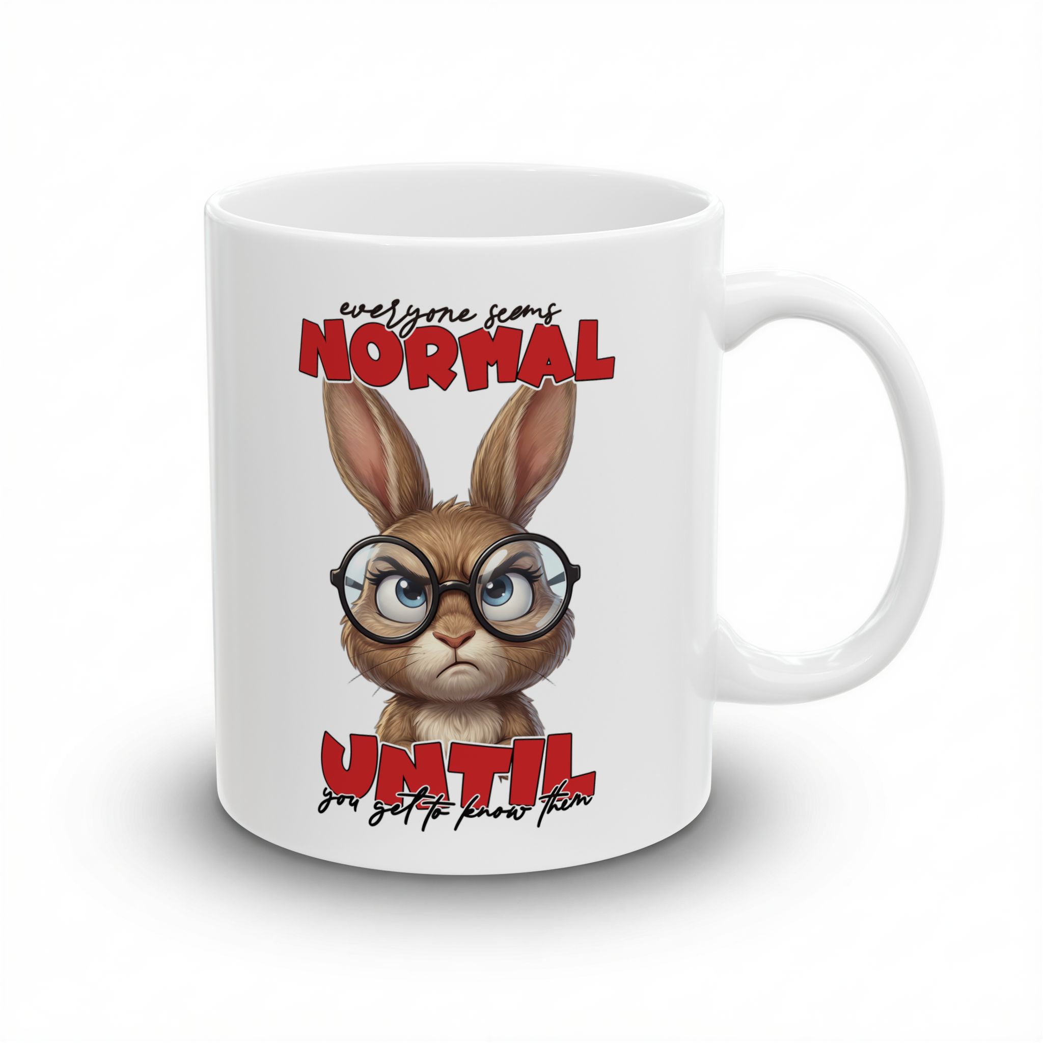 White ceramic mug with a grumpy-looking bunny wearing glasses and sarcastic text.