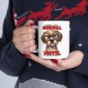 White ceramic mug with a cartoon dog wearing glasses and a sarcastic expression.
