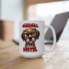 White ceramic mug with a grumpy cartoon dog wearing glasses and the text 