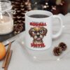 White ceramic mug with a funny, grumpy dog wearing glasses and text that reads 