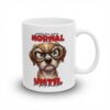 White ceramic mug with a cartoon puppy wearing glasses and the text 