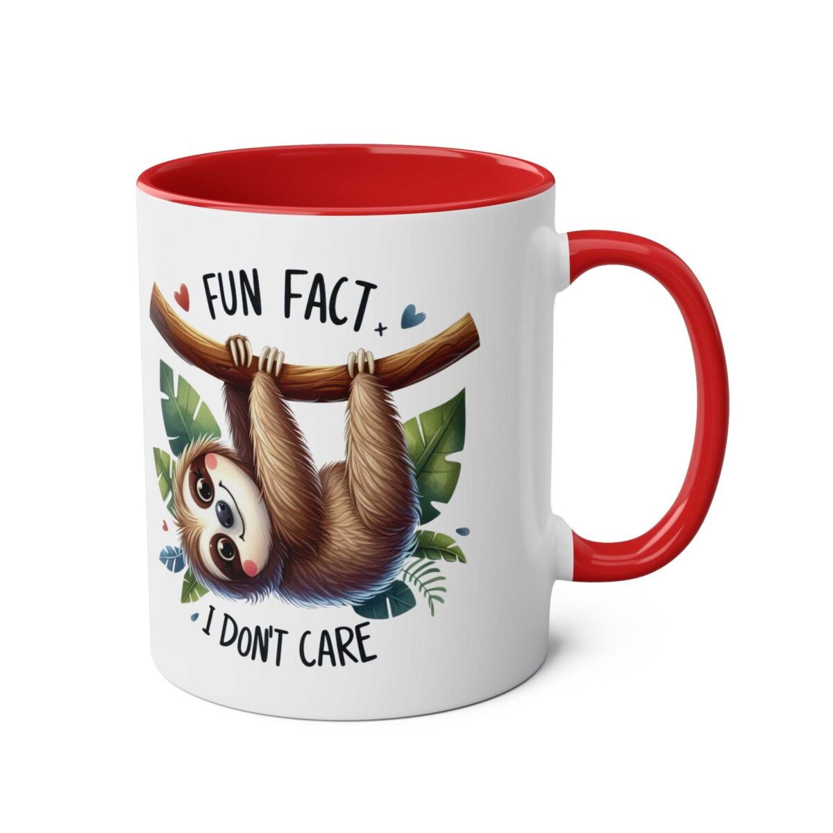 White ceramic mug with a red interior and handle, featuring a cartoon sloth hanging from a branch with leaves and the text "FUN FACT + I DON'T CARE".