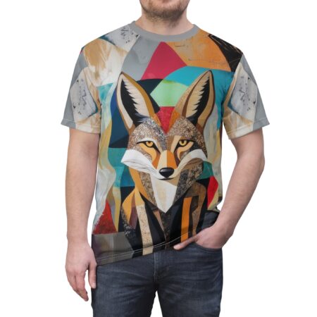 Geometric shapes in earthy tones and vibrant colors cover this seamless pattern tee, depicting a stylized wolf's face with sharp features.