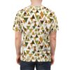 Earth tone triangles in varying shades of green, brown, and gold cover this patterned tee shirt with a geometric all-over design.
