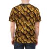 Gleaming gold scales with intricate dark lines cover this patterned tee shirt for a fierce fantasy look.