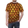 Golden and amber dragon scales with textured detailing cover this graphic streetwear tee, creating a fierce, armored look.