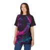 Neon pink, electric blue, and deep purple hues cover this patterned tee shirt, depicting a powerful gorilla in a street art style against a cityscape.