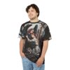 Dark blues, blacks, and grays cover this 3D graphic t-shirt, depicting a gothic angel embracing a woman before a castle.