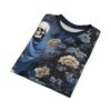 Folded blue t-shirt with skull and botanical floral print.