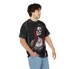 Black all over print sublimation tee, smiling clown figure, red braided hair, crown, corset, elaborate necklace, white ornate borders.