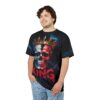 Black t-shirt with a striking graphic of a skull wearing a crown. The skull is split with one side white and the other red, with the word KING emblazoned below.