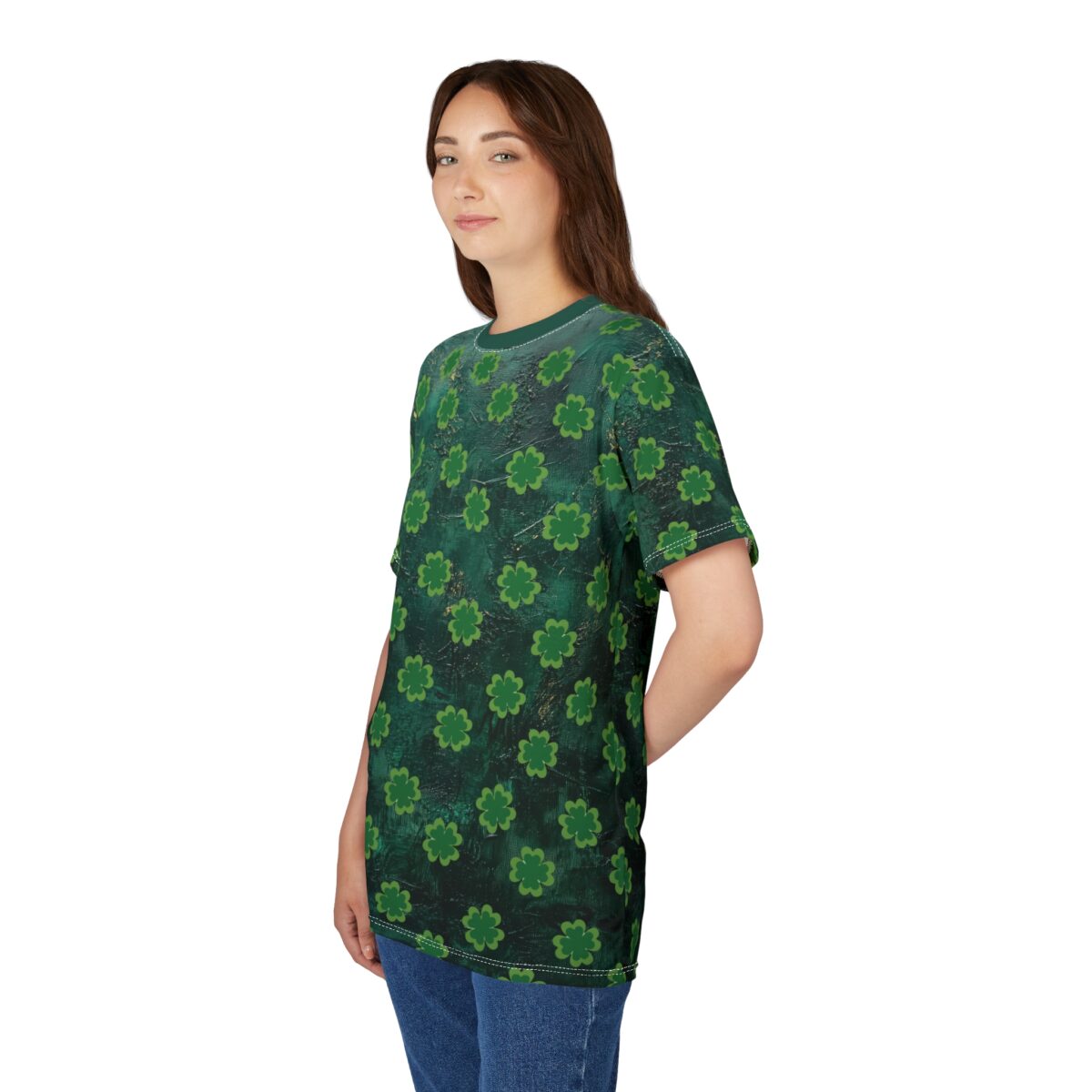 Green crewneck t-shirt features a repeating pattern of bright green clover leaves on a darker, textured green background.