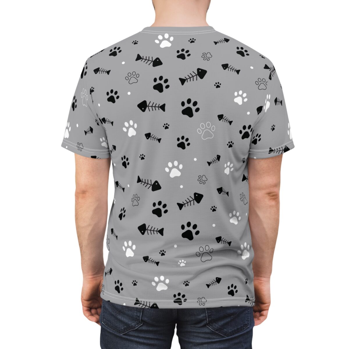 Grey crewneck t-shirt featuring a repeating pattern of black and white paw prints and fish skeletons scattered across the fabric.