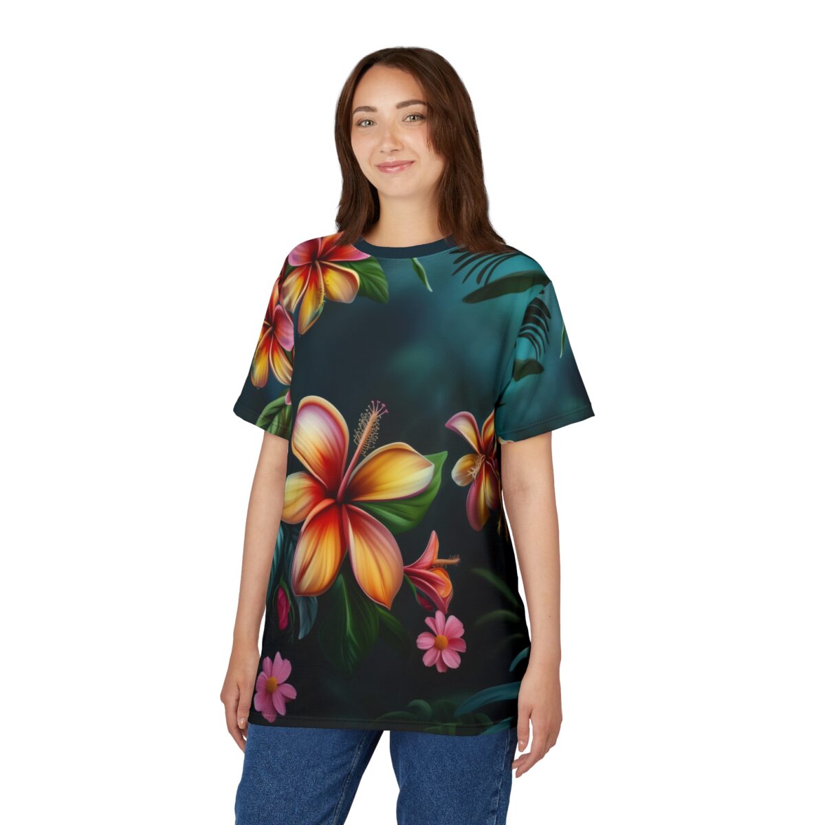 All over print sublimation tee showcasing vibrant Hawaiian hibiscus flowers and tropical leaves on a dark teal background.