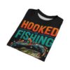 Orange and teal text with a bass fish and splashing water cover this all over print apparel for anglers.