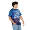 Blue t-shirt with white text and a coffee cup graphic that reads 'I love my coffee like I love my man, strong, hot & sweet.'