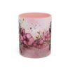 Pink watercolor floral mug with gold splatters and text 'Just a Mom Who Loves Dogs' for dog lovers.