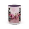 White ceramic mug with purple interior, featuring a pink watercolor design with gold splatters and floral accents. Text reads 'Just A Mom Who Rescues Dogs'.