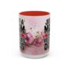 White ceramic mug with pink floral watercolor design, featuring bold text 'Just A Mom Who Rescues Dogs' and a red heart accent.