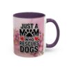 Purple and white mug with floral watercolor background, featuring bold text "JUST A MOM WHO RESCUES DOGS" and a paw print.
