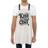 White chef's apron with 'Kiss the Chef' text, featuring red lips and a chef hat graphic.