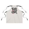 Cream kitchen apron with 'Kiss the Chef' graphic, featuring red lips, chef hat, fork, and heart accent. Perfect for cooking.