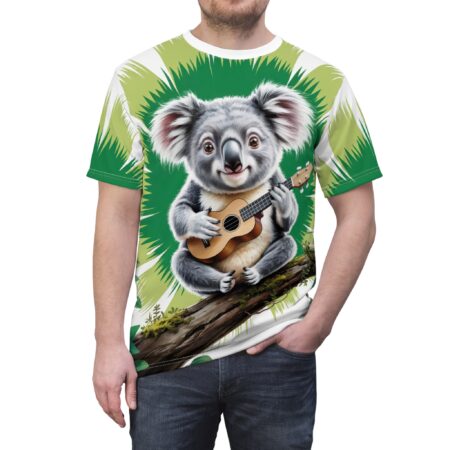 Green palm fronds and a detailed koala playing a ukulele cover this 3D graphic t-shirt, sitting on a mossy log.